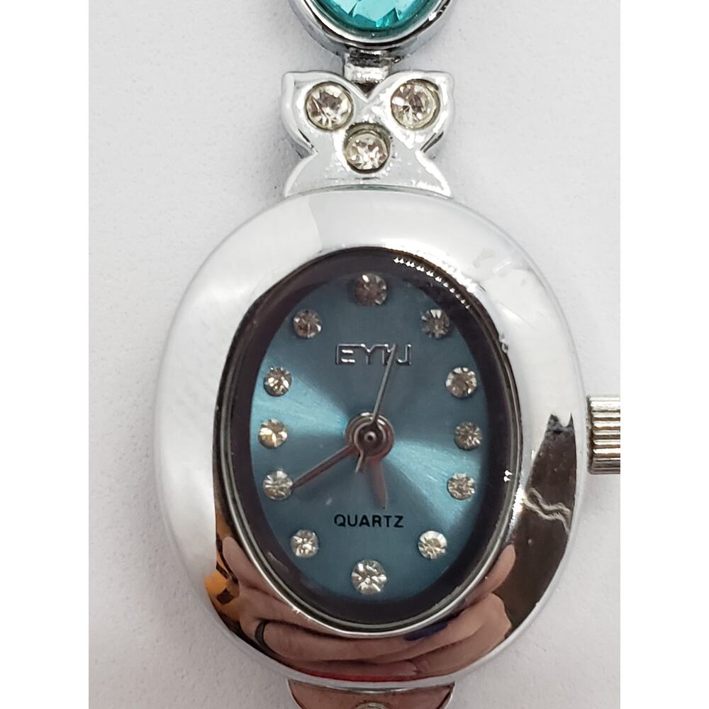 Eyki women's watch. Blue iridescent face. Jeweled band. 9168315 Working watch